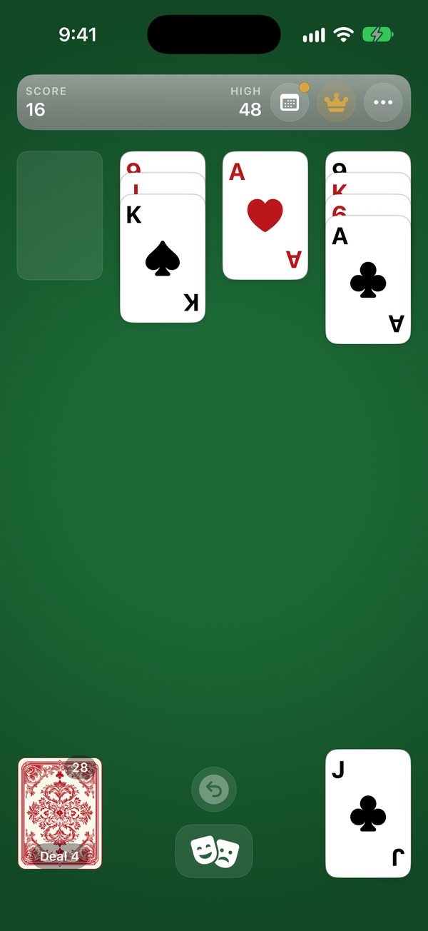 Aces Up Solitaire in progress: four piles on green felt with the Ace of hearts and the Ace of clubs showing